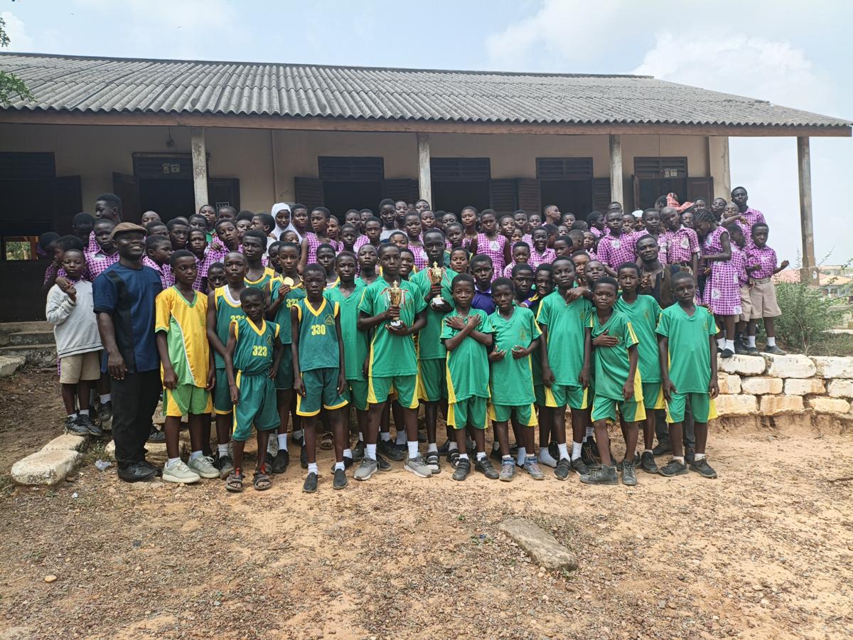 School Athlete With Trophies Won During the Inter schools Competition